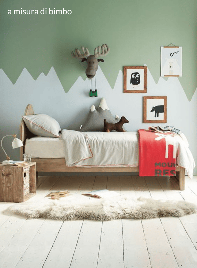 childrens bedroom with painted mountain range 